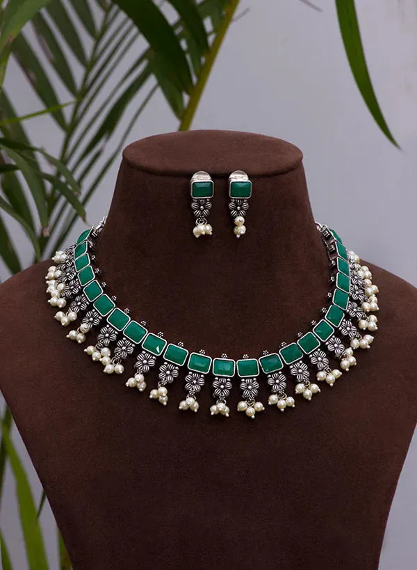 Exclusive Emerald Stone Embellished Designer Oxidized Necklace Set With Earrings And Pearl Beads