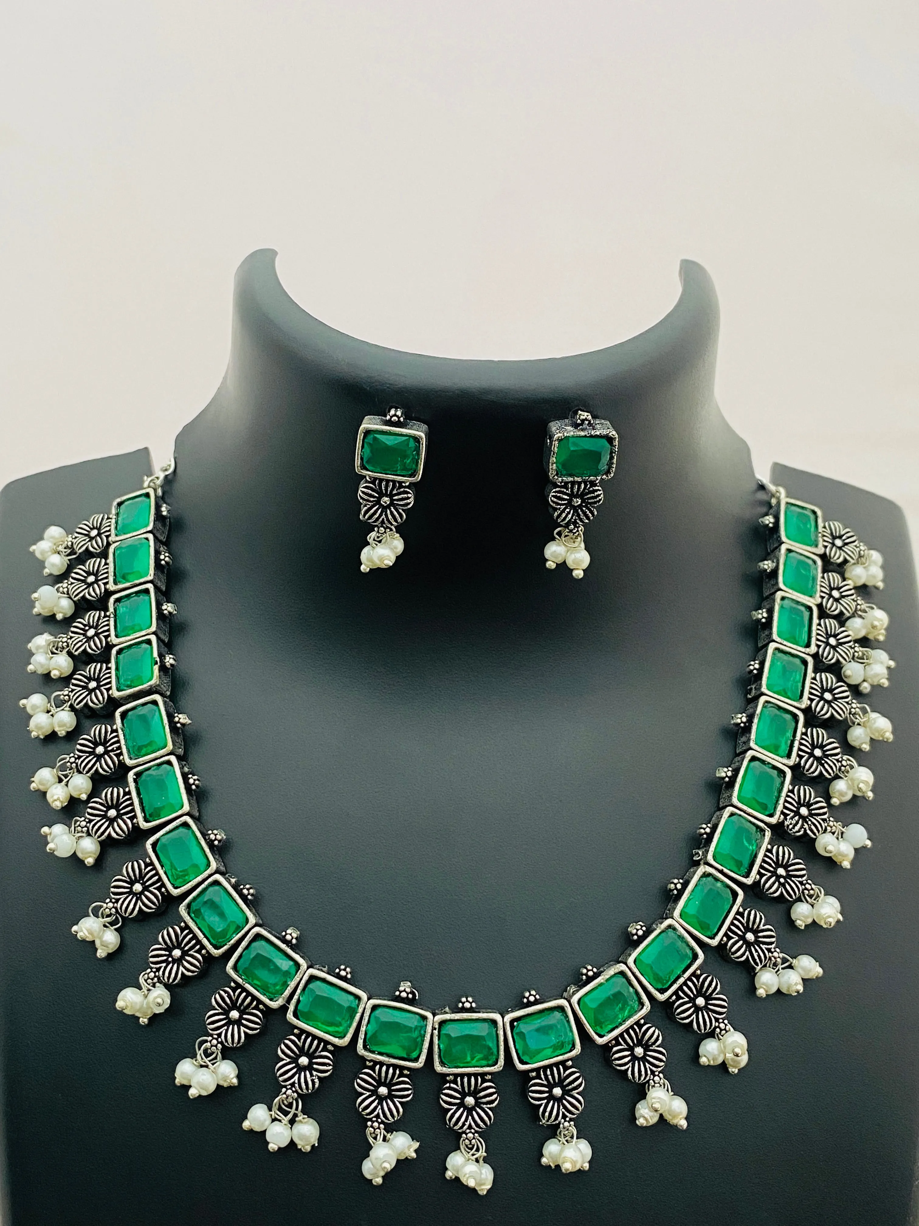 Exclusive Emerald Stone Embellished Designer Oxidized Necklace Set With Earrings And Pearl Beads