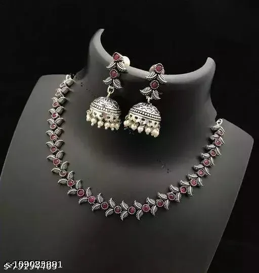 Fascinating Silver Oxidized Ruby Stone Studded Vintage Design Sleek Necklace Set With Jhumka Earrings