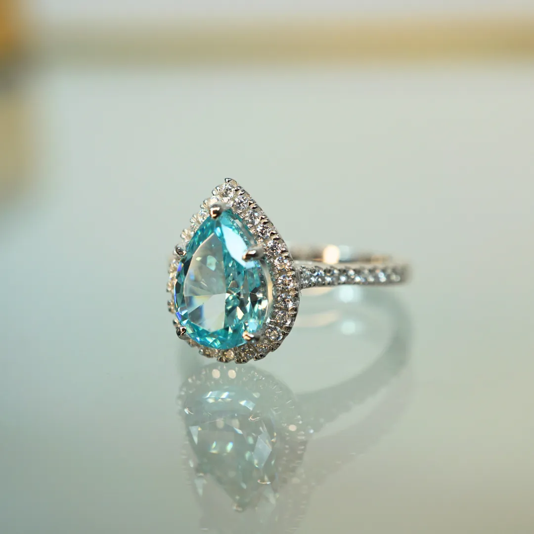 NISSI AQUAMARINE   MOISSANITE RING