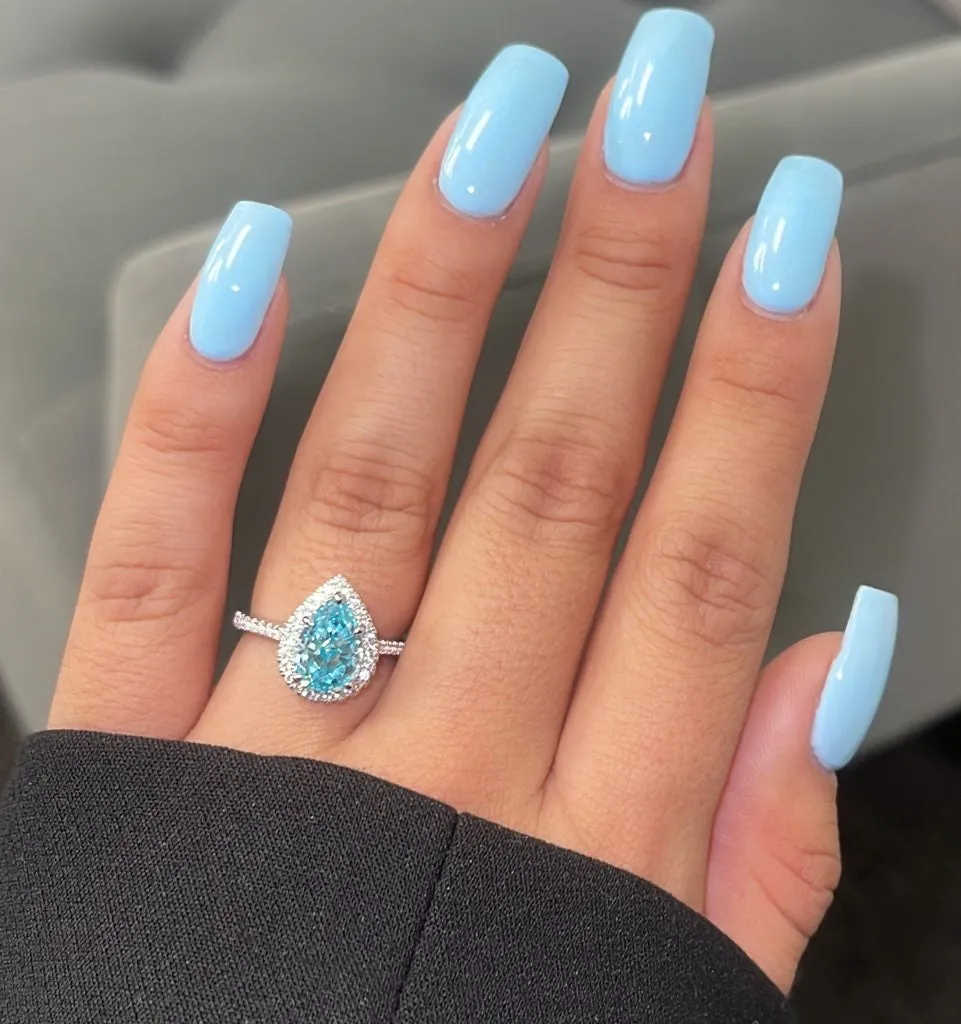 NISSI AQUAMARINE   MOISSANITE RING